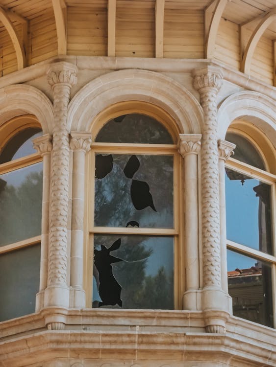 Emergency glass repair team boarding up broken window in Castle Rock Colorado by High West Glass